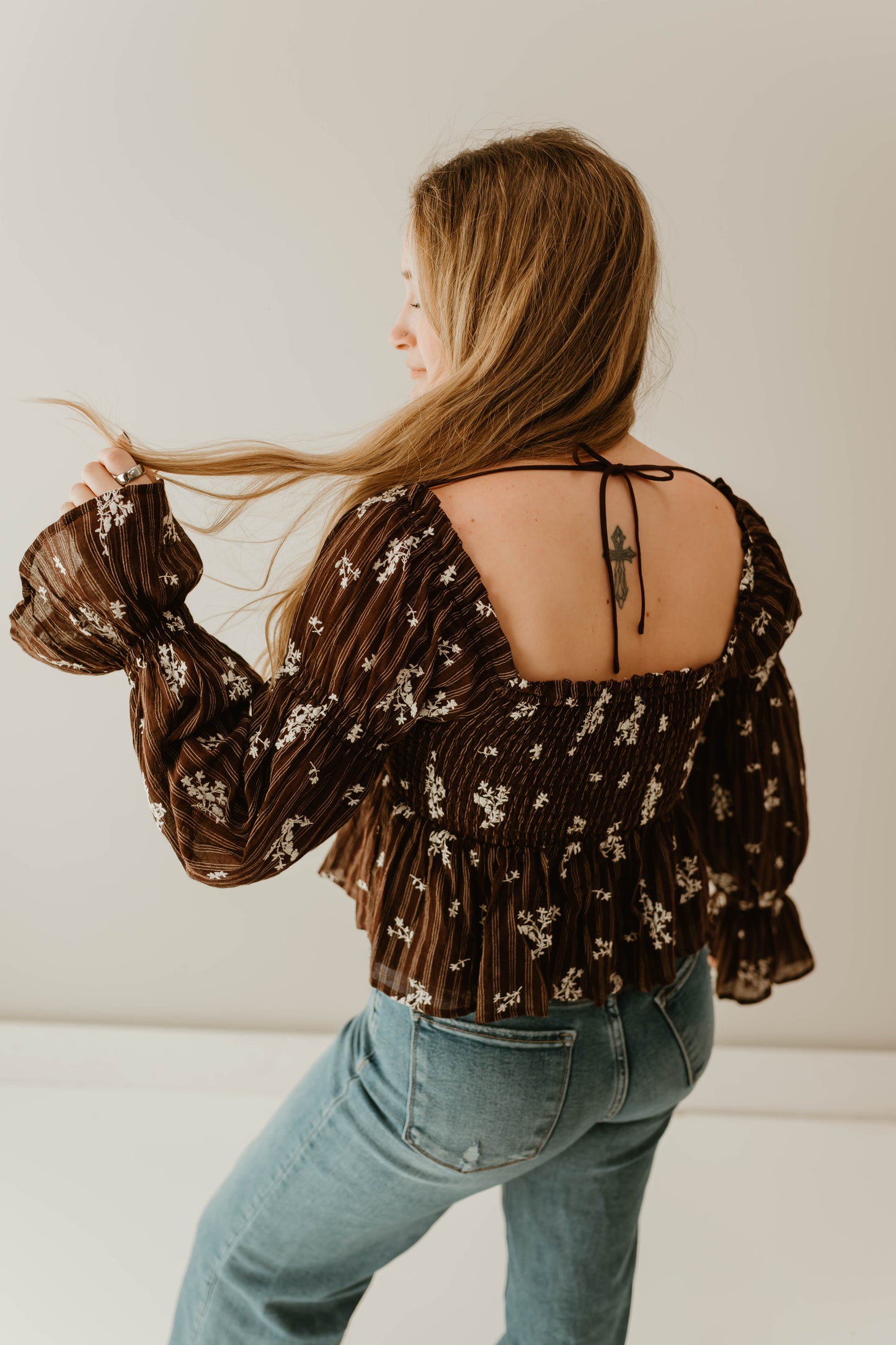 FLORAL TIE FRONT PEPLUM TOP