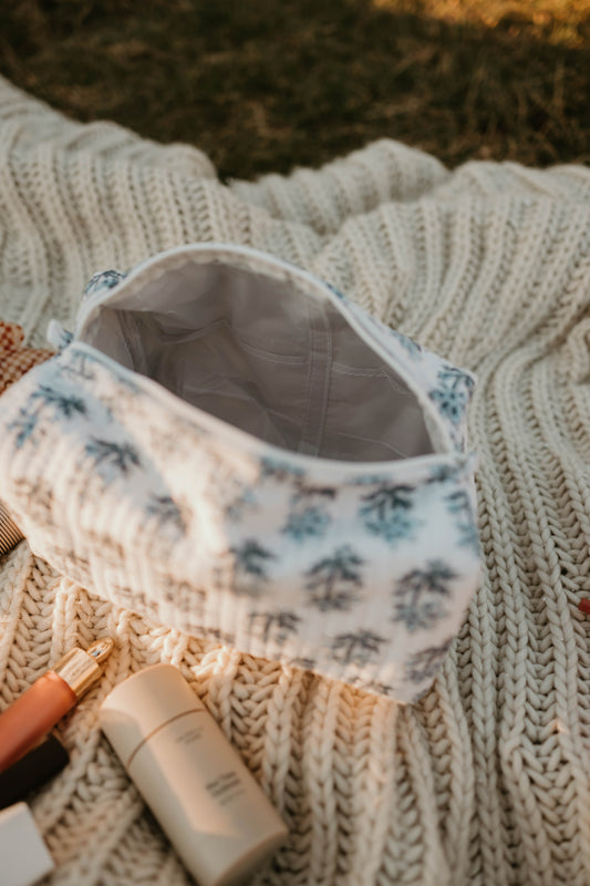 BLUE + IVORY FLORAL MAKEUP BAG