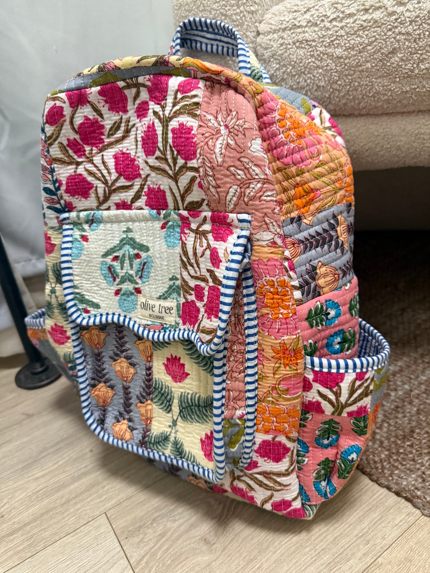 MULTI COLOR PATCH BACKPACK