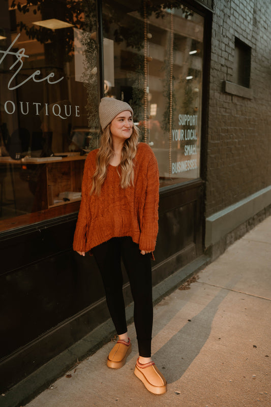 RUST BRAIDED KNIT SWEATER