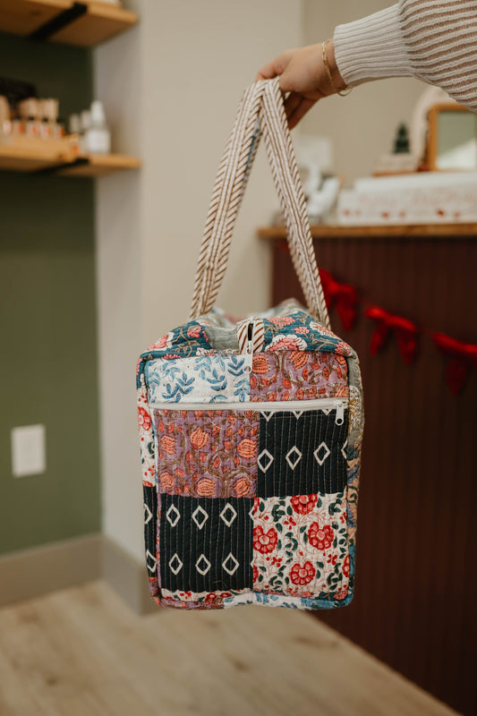 NAVY + PURPLE QUILTED PATCHWORK DUFFLE