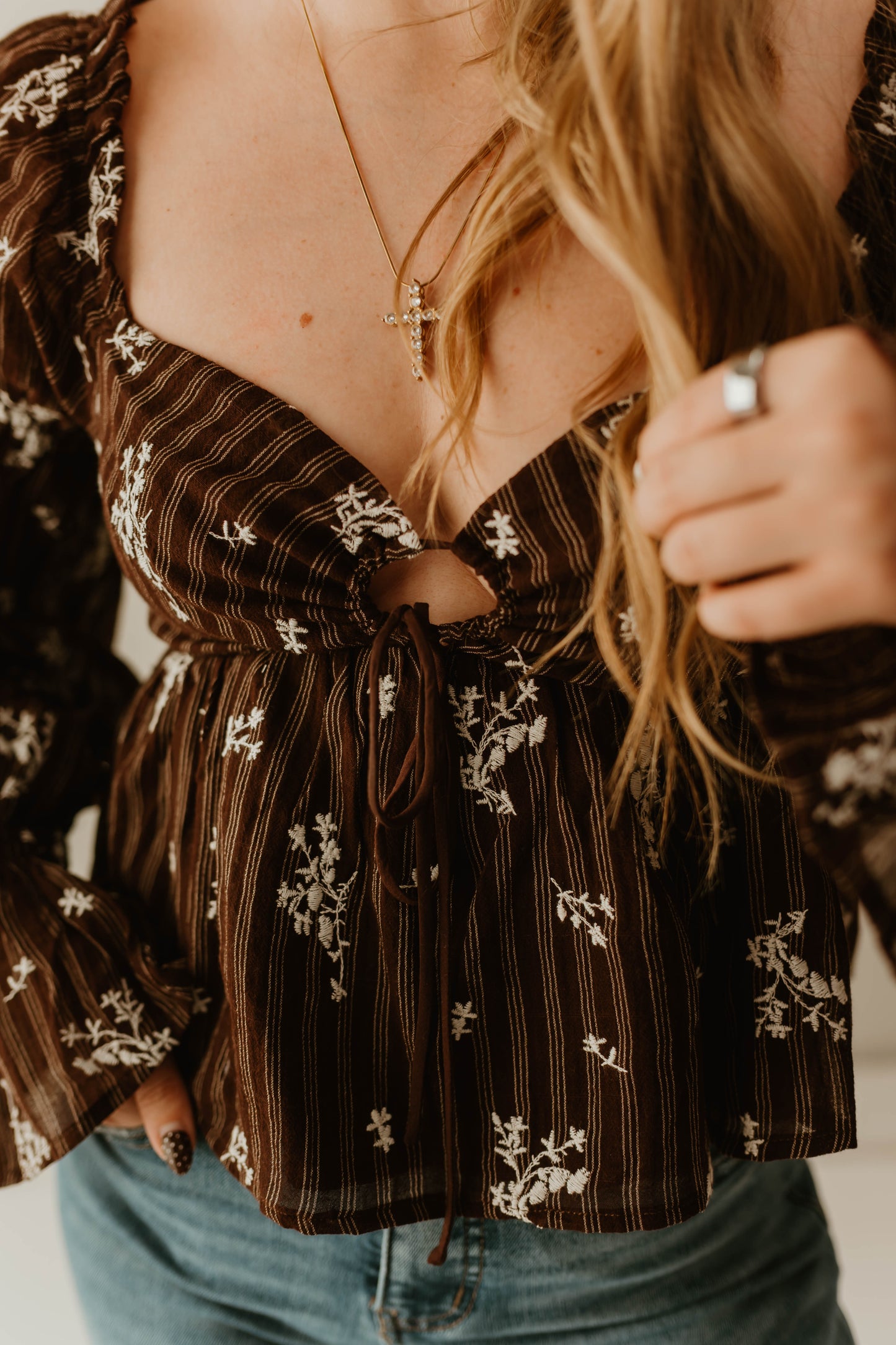 FLORAL TIE FRONT PEPLUM TOP