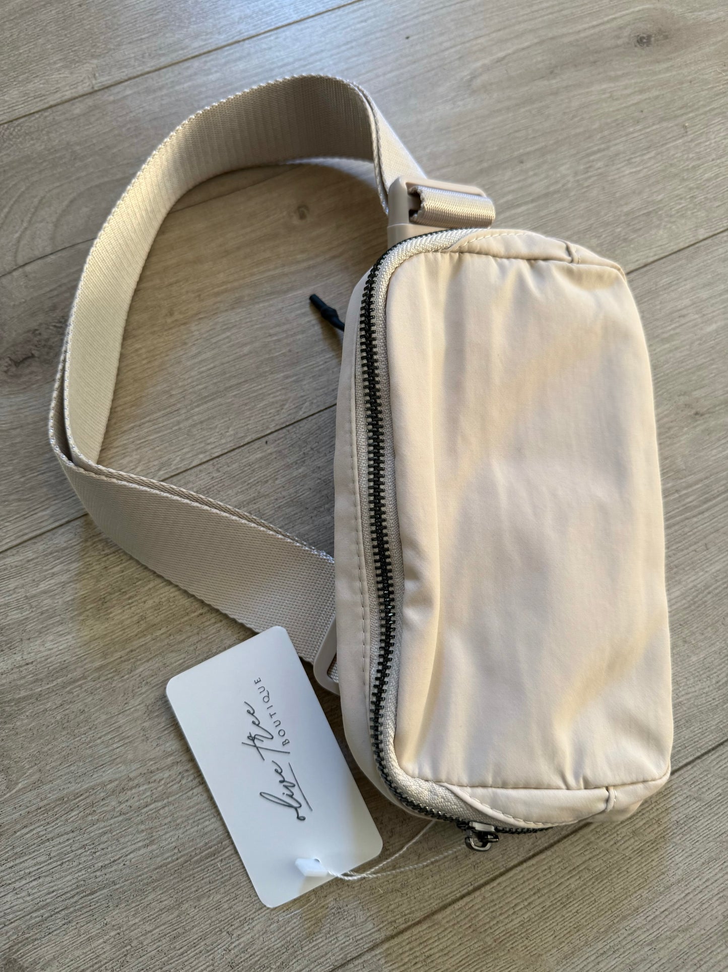 CREAM BELT BAG