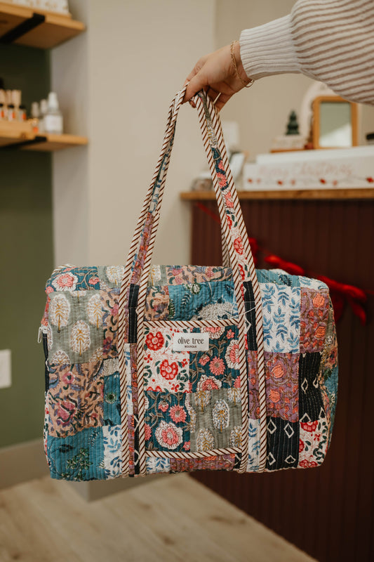 NAVY + PURPLE QUILTED PATCHWORK DUFFLE