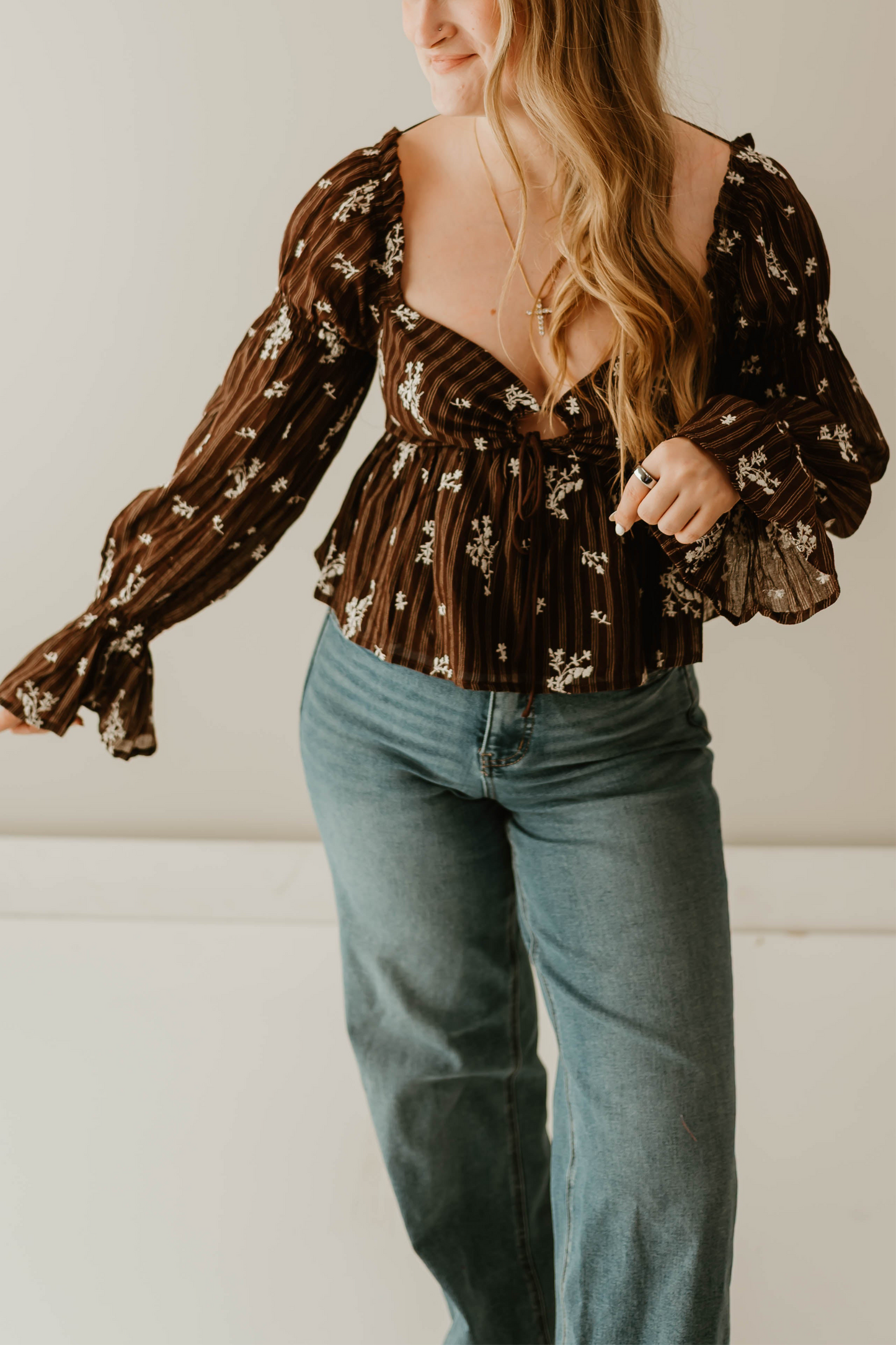 FLORAL TIE FRONT PEPLUM TOP